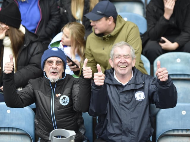 Peterborough United fans watch their side struggle to a 2-2 draw at home to Salford.