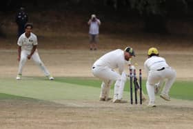 A wicket for young Peterborough Town spinner DJ  Sivaganeshan at Finedon. Photo Andy Dann