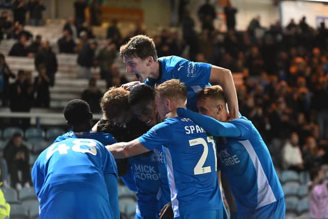 Posh celebrate a goal against Blackpool. Photo David Lowndes.