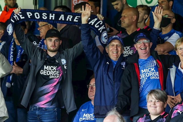 Posh fans watch the 3-0 defeat at Luton Town on the opening day of the 2021/22 season