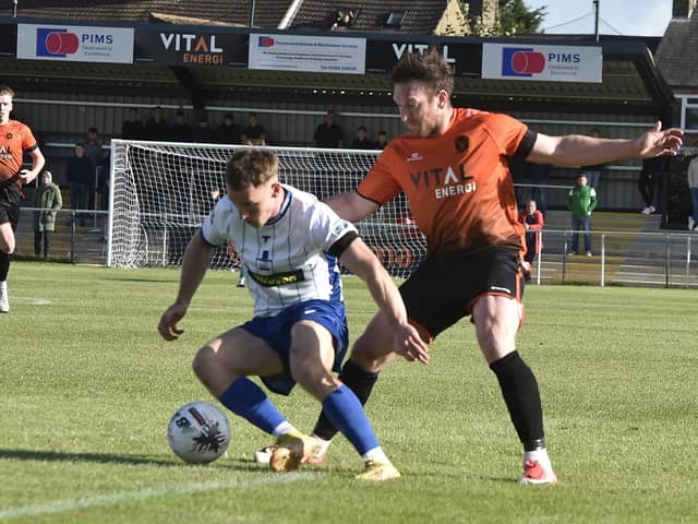 Peterborough Sports hope to have Matt Tootle (orange) back for the game against Tamworth. Photo: David Lowndes.
