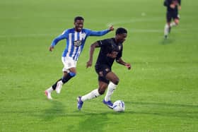 Bolu Shofowoke in action for Peterborough United against Huddersfield Town. Photo: Joe Dent.