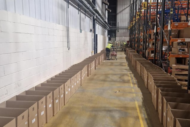 The boxes are lined up in the Yours Clothing warehouse ready for filling.
