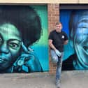 Peterborough street artist Nathan Murdoch with his latest project in St Marks Street