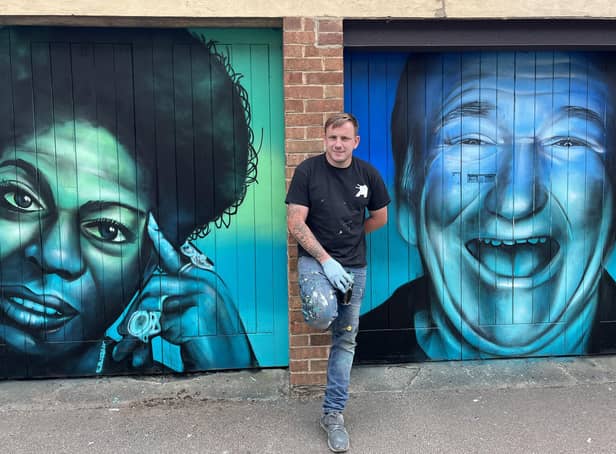 Peterborough street artist Nathan Murdoch with his latest project in St Marks Street