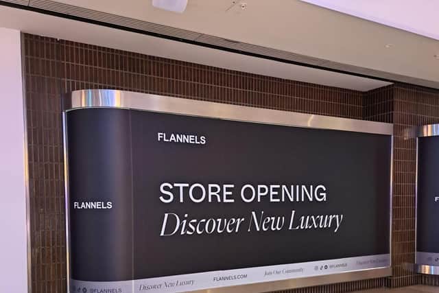 Signs in the Queensgate Shopping Centre that retail giant Frasers is looking to open its first store in Peterborough