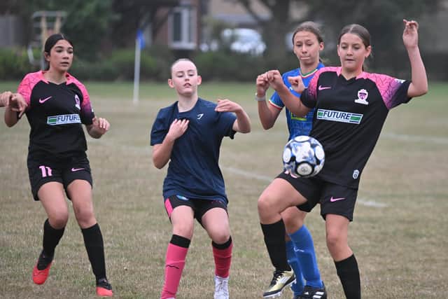 Action from ICA Sports (blue) v RTC in a Cambs Under 13 Girls League match at Ringwood. Photo David Lowndes.