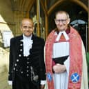 High Sheriff Bharatkumar Khetani and his wife Pretty with Dean of Peterborough Cathedral Very Revd Christopher Dalliston.