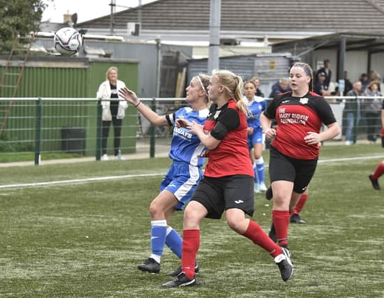 Action from Yaxley Phoenix Ladies (blue) v Leicester City in the Women's FA Cup. Photo: David Lowndes.
