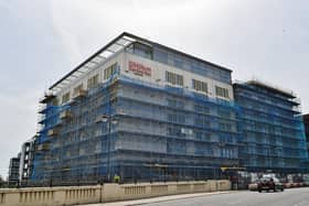 Scaffolding is coming down at the Hilton Garden Inn at Fletton Quays. The flagship hotel is expected to open next March.