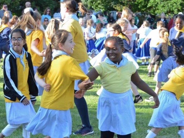 All Saints C of E school taking part the Country Dance Festival at The Peterborough School.