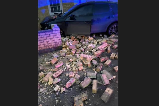 The car destroyed a wall on Elmfield Road, Dogsthorpe. Photo: Malcolm Smart.