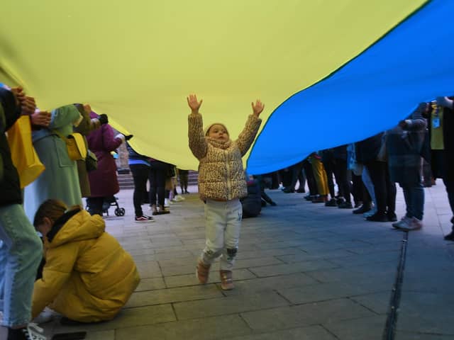 The vilgil on Cathedral Square to mark a year since Russia invaded Ukraine.
