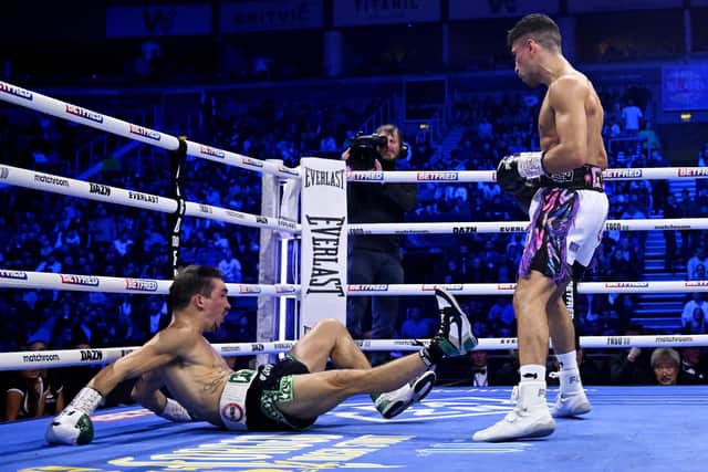Jordan Gill has knocked Michael Conlan to the floor in the second round. Photo by Charles McQuillan/Getty Images.