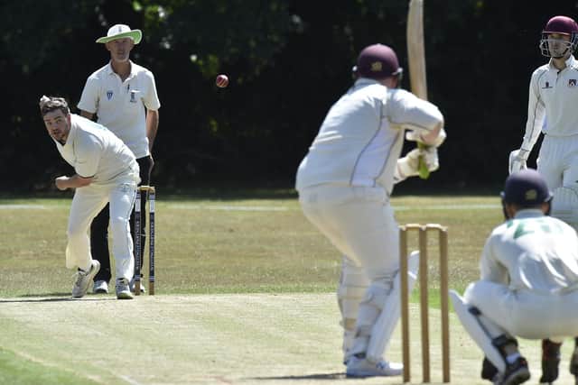 Shaun Dunn bowling for Castor against Waresley. Photo: David Lowndes.