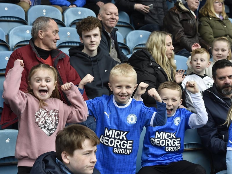 Peterborough United fans watch the defeat against Bolton Wanderers.