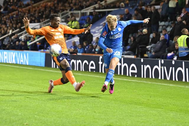 Harley Mills sends over a cross for Posh against Cardiff City, Photo David Lowndes