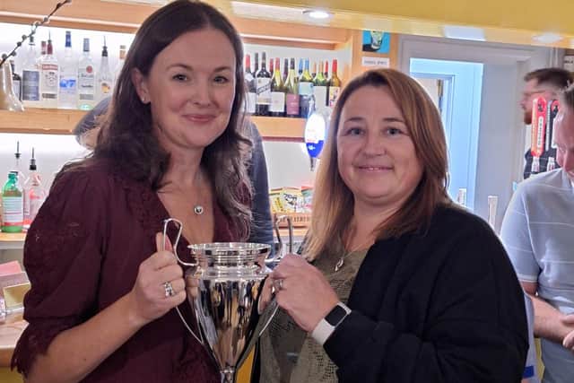 Prize winner Kelly Johnson (right) with Vicki Fisher.