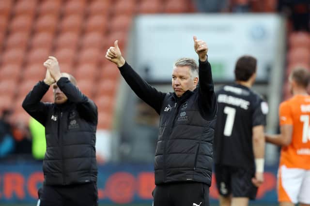 Peterborough United Manager Darren Ferguson thanks the Posh fans after victory over Blackpool. Photo: Joe Dent.