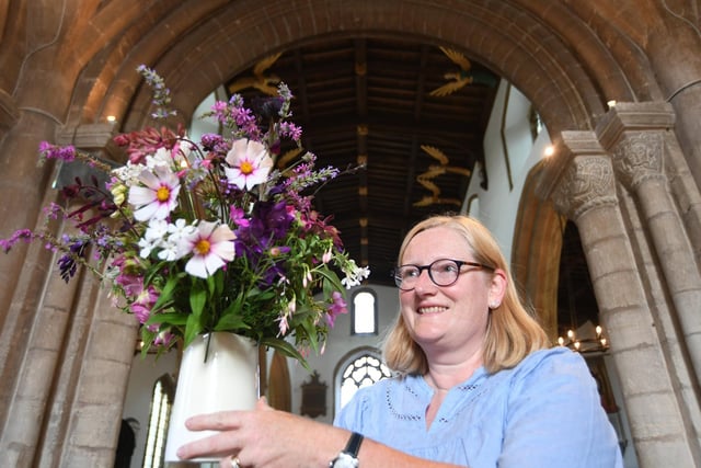 Linda Cookwith her floral display