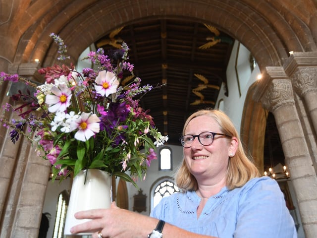 Linda Cookwith her floral display
