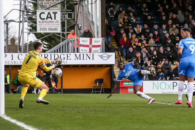Posh winger Kwame Poku has a shot at goal saved by Jack Stevens of Cambridge United. Photo Joe Dent/theposh.com