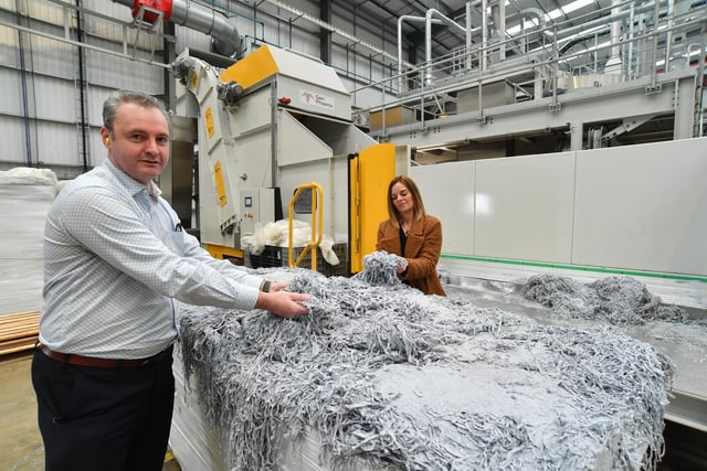 Mark Harvey, chief financial officer with Gen Phoenix of Peterborough, and Nicola​​​​ Rapley, marketing communications manager, with some of the waste leather as it is transformed for use in a range of new products.