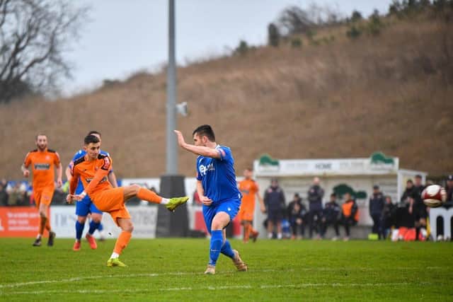 Matt Sparrow (left) scored and was then sent off for Deeping Rangers Reserves.
