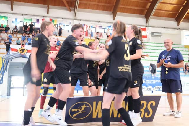 City of Peterborough Futsal Club Under 14s celebrate their European success.