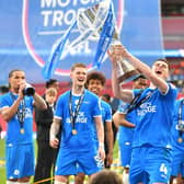 Ronnie Edwards leads the Posh celebrations after the EFL Trophy win over Wycombe Wanderers at Wembley. Photo David Lowndes.