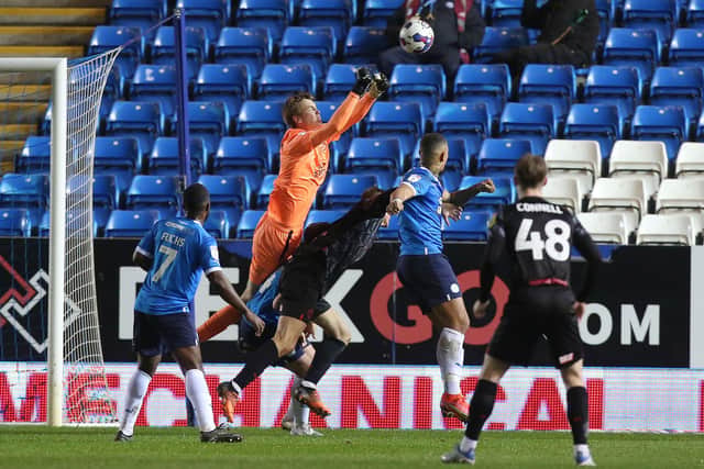 Lucas Bergstrom punches the ball clear against Barnsley. Photo: Joe Dent.