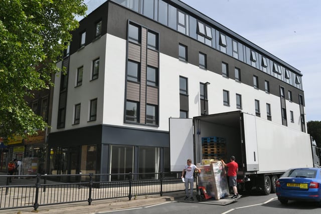 The exteriors of a new co-living facility above the former Poundland store in Bridge Street are complete. The bottom floor will be retained for retail use.