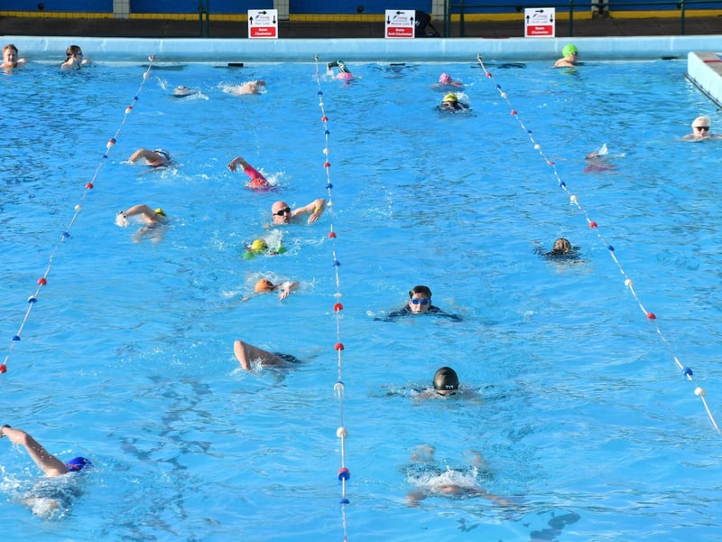 Swimmers enjoy some morning sun.