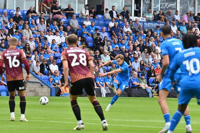 Archie Collins shoots at goal for Posh against Bradford. Photo David Lowndes.