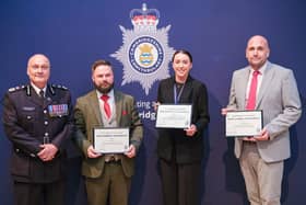 Detective Inspector Lee Levens, Detective Sergeant Rob Hutchings and detective constable Lauren Easton receiving their commendations.