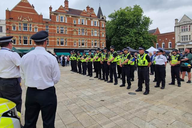 Police officers report for duty in Cathedral Square.