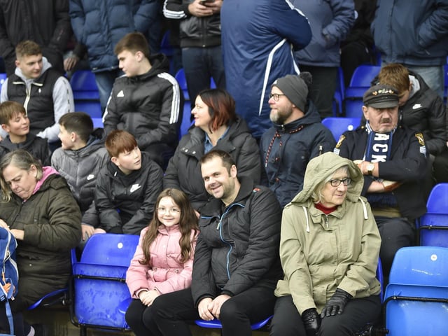 Peterborough United fans watch their side struggle to a 2-2 draw at home to Salford.