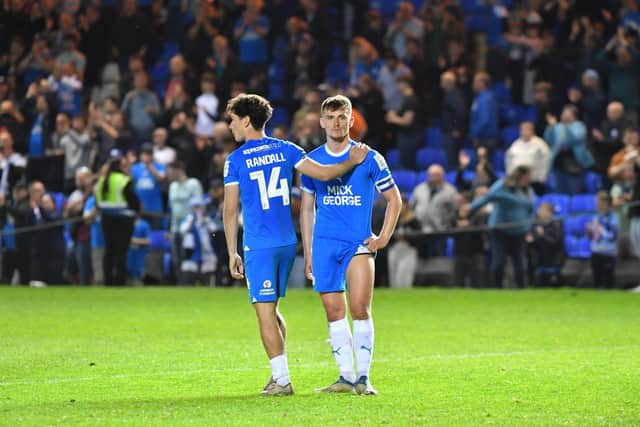 Joel Randall and Harrison Burrows after last season's play-off semi-final defeat at the hands of Oxford United. Photo David Lowndes.