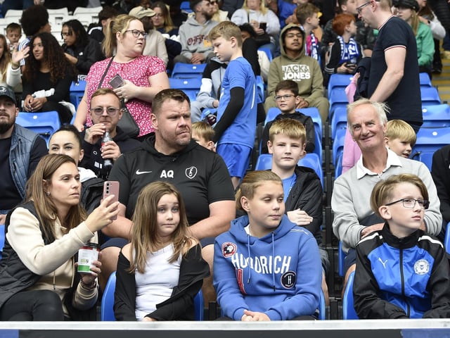 Peterborough United fans are pictured enjoying the win over Bristol Rovers.