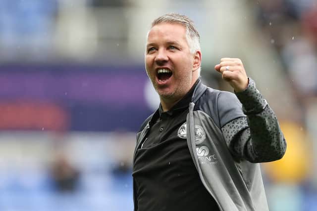 Peterborough United Manager Darren Ferguson celebrates the victory at full-time in front of the travelling fans. Photo: Joe Dent.