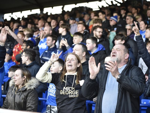 Peterborough United fans are pictured enjoying another home win.