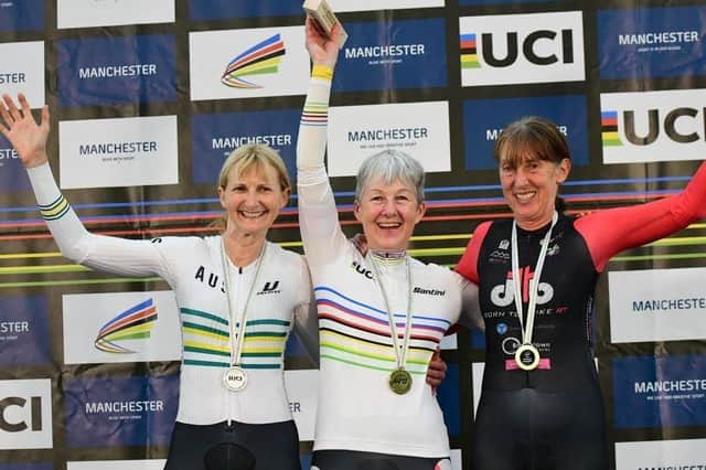 Lyndsay Clarke on top of the podium at the Manchester Velodrome.