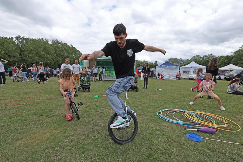 Dylan Spinks tries out the unicycle on the circus skills.