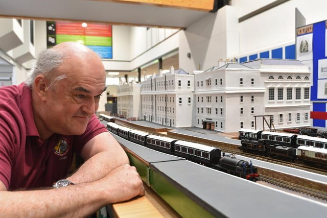 Market Deeping Model Railway Club member Dave Ashwood with the 1875 model of Euston Station.