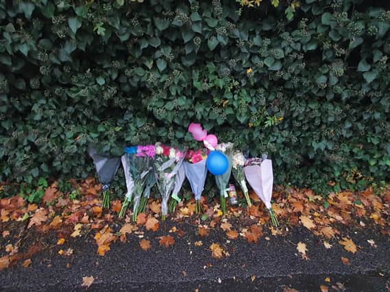 Flowers left close to the scene of the incident.