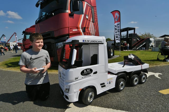 Mason Mansell with his miniature radio-controlled truck
