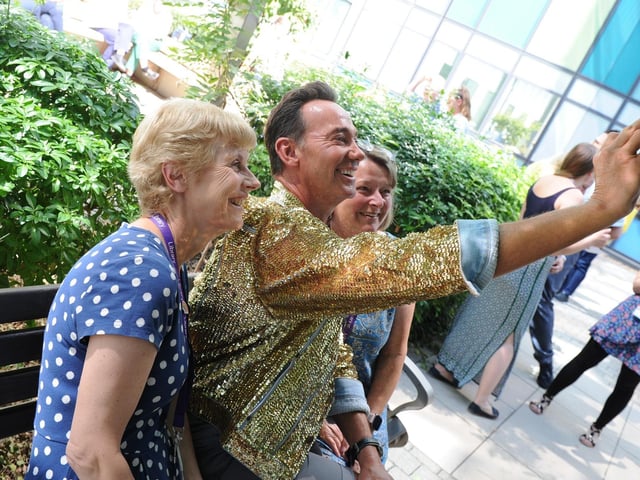 Craig posed for selfies with workers