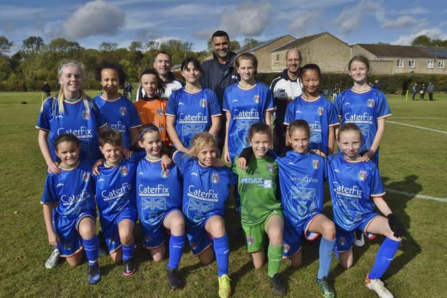ICA Juventus girls under 12s with coaches Adam Bevilacqua and Steve Bentham and sponsor Ajaz Akhtar from Caterfix. Photo: David Lowndes.