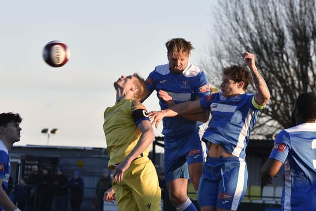 Action from Yaxley (blue) v Spalding on New Year's Day. Photo: David Lowndes.