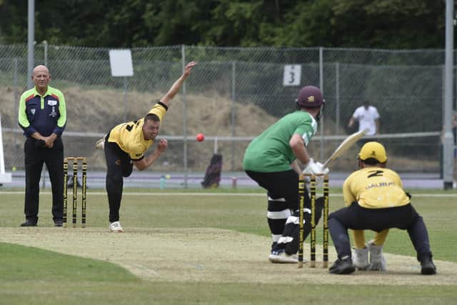 Jamie Smith bowling for Peterborough Town against Overstone. Photo: David Lowndes.